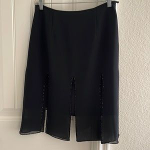Black Jessica Howard skirt with pleads size 4 waist flat across 15” length 24”